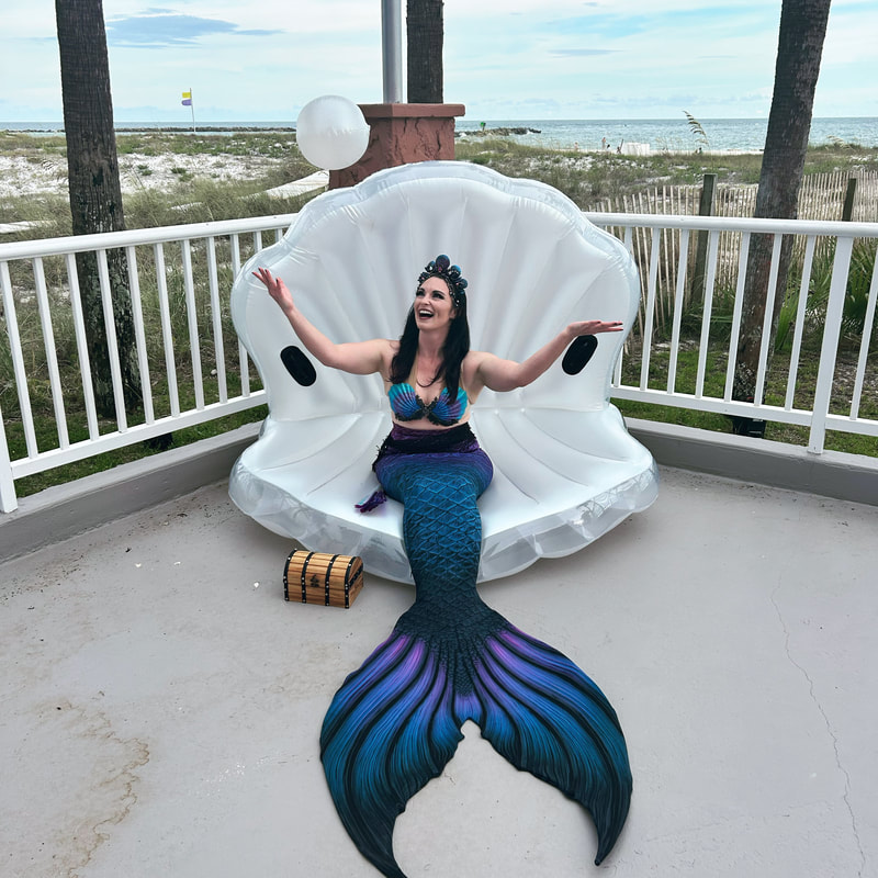 Perdido Beach. Entertainment party company mermaid for booking. Pensacola beach mermaid. Mermaid entertainment.
resort entertainment 